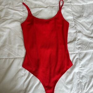Red body suit small